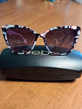 bebe Cat-Eye Sunglasses in Pink and Black Floral Print